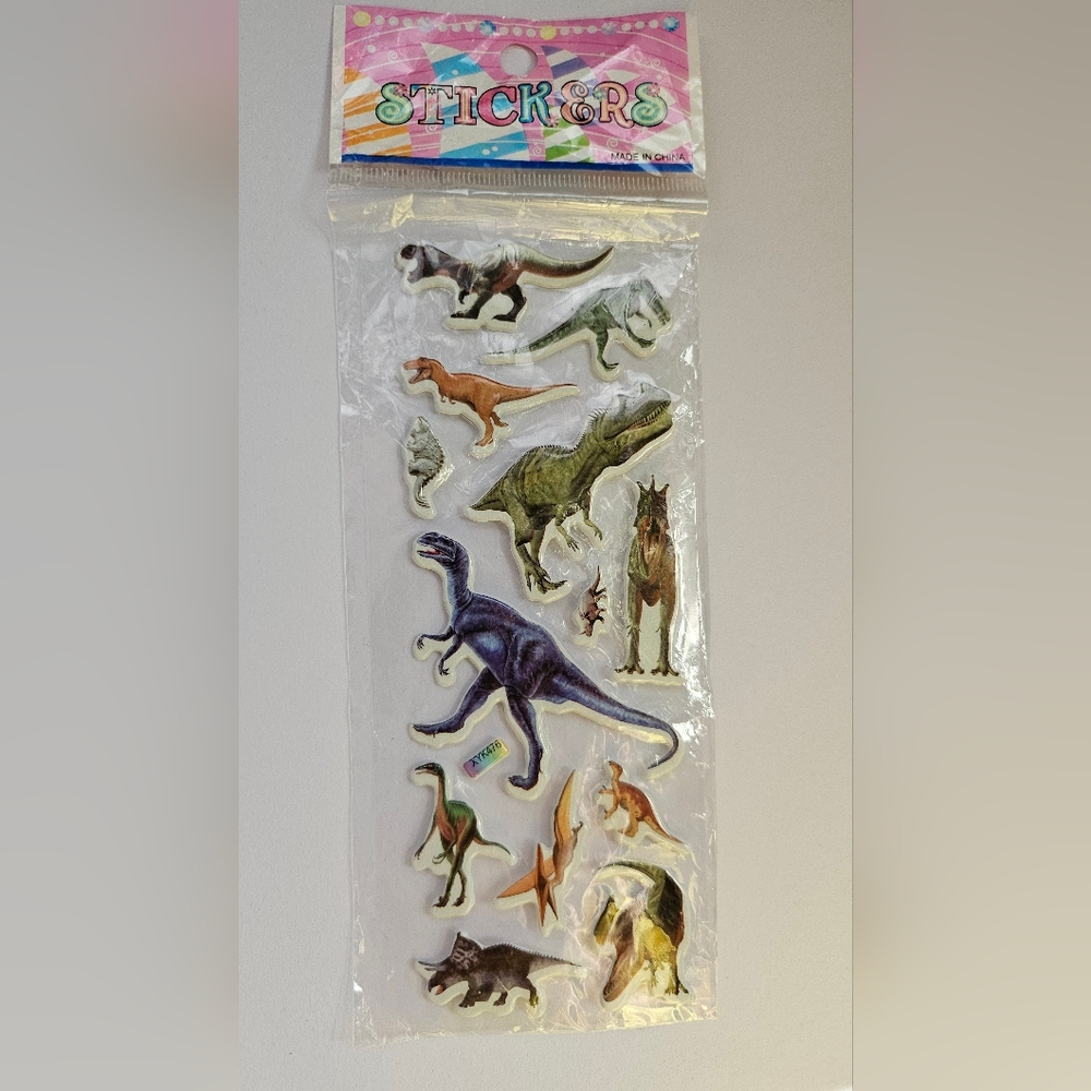 Dinosaur themed stickers, new, 1 sheet.